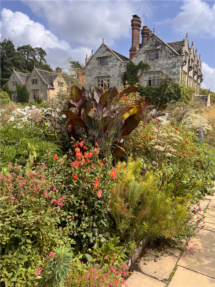 gravetye-manor 4032 house from garden in sun superb-crop-v2.jpeg